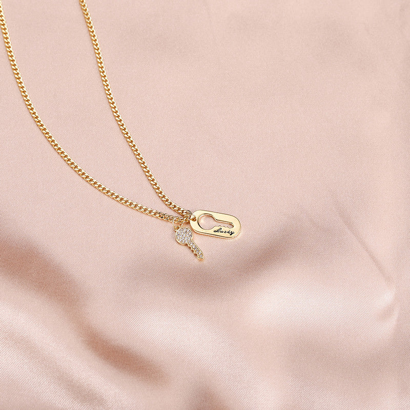 Lucky Key & Keyhole Necklace – Gold Chain with Rhinestone Details
