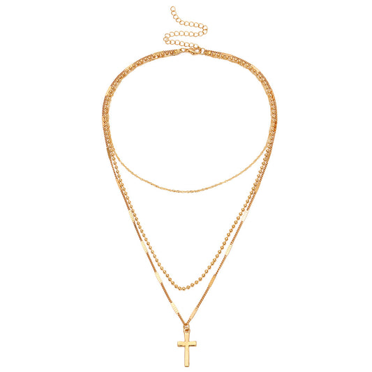 Gold Multi-Layer Necklace with Cross Pendant – Chic & Timeless Look