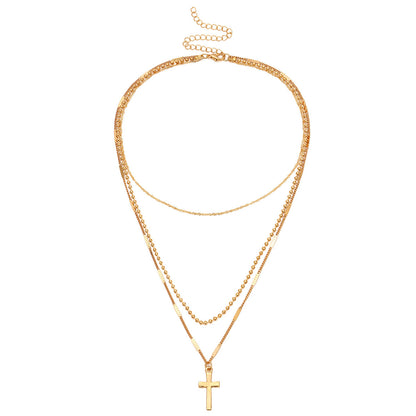 Gold Multi-Layer Necklace with Cross Pendant – Chic & Timeless Look